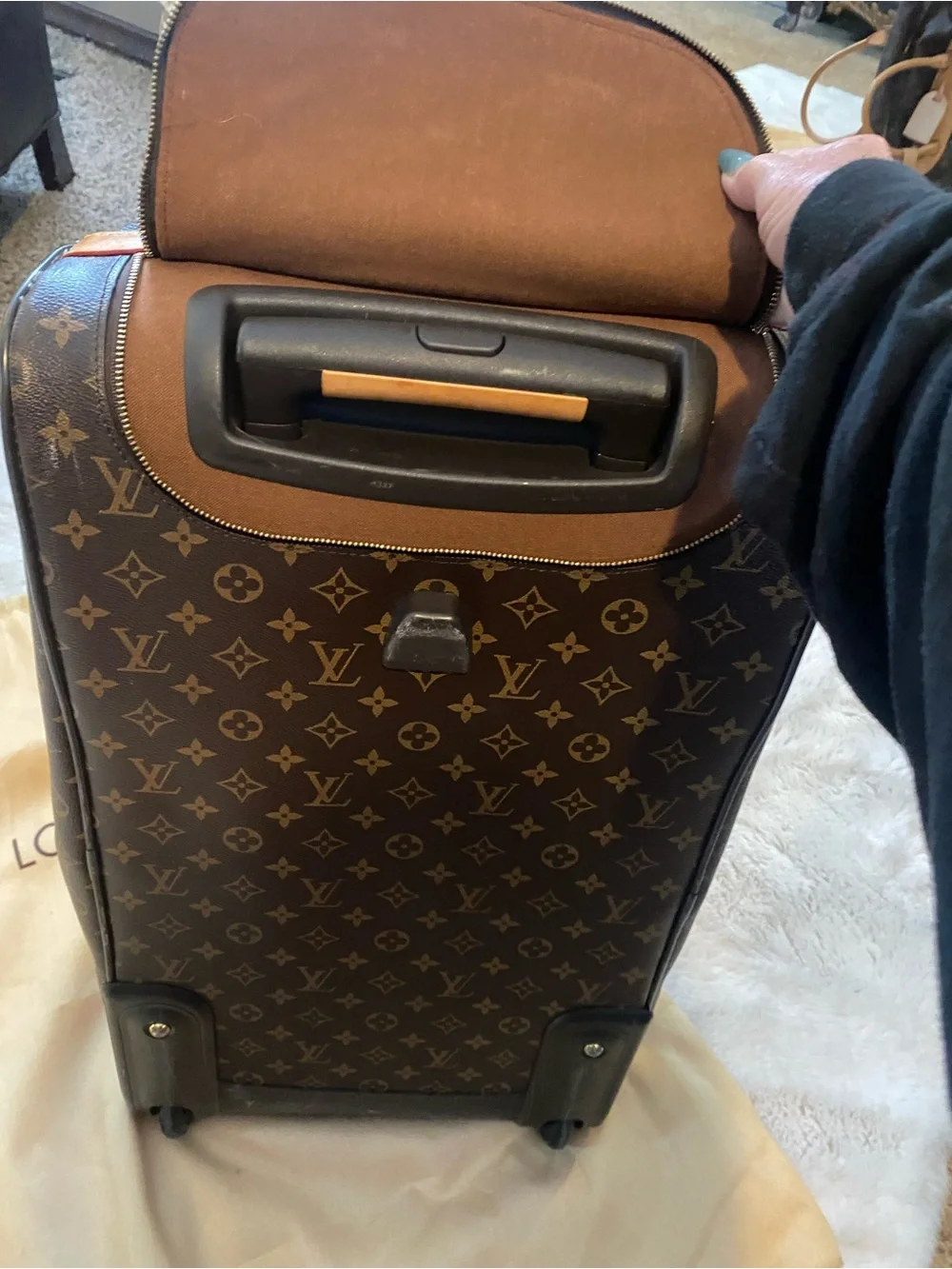 Louis Vuitton Monogram Canvas rolling Travel Bag with Natural Vachetta Trim